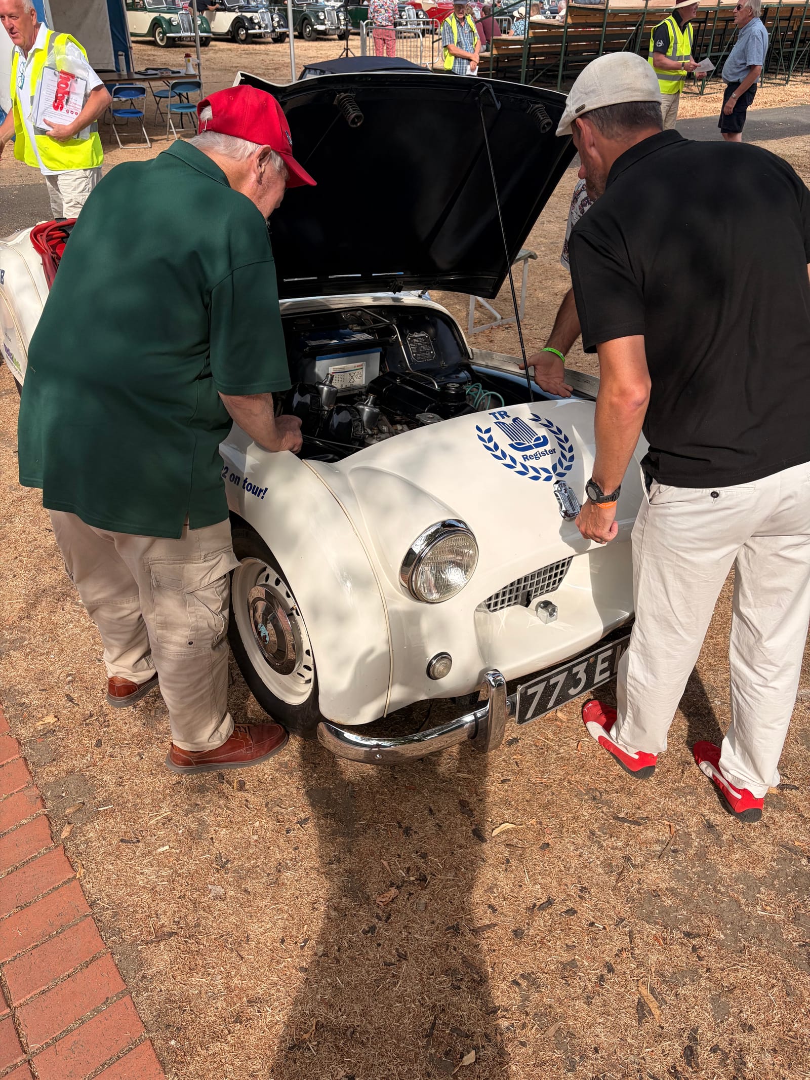 James leaning over TS2’s open bonnet, recognising his own work on the engine
