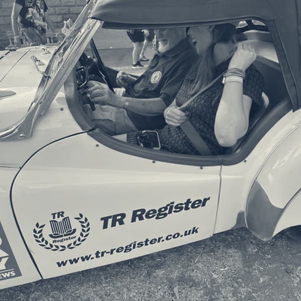 Evie in TS2's passenger seat with Keith Read at the wheel, before the show opened