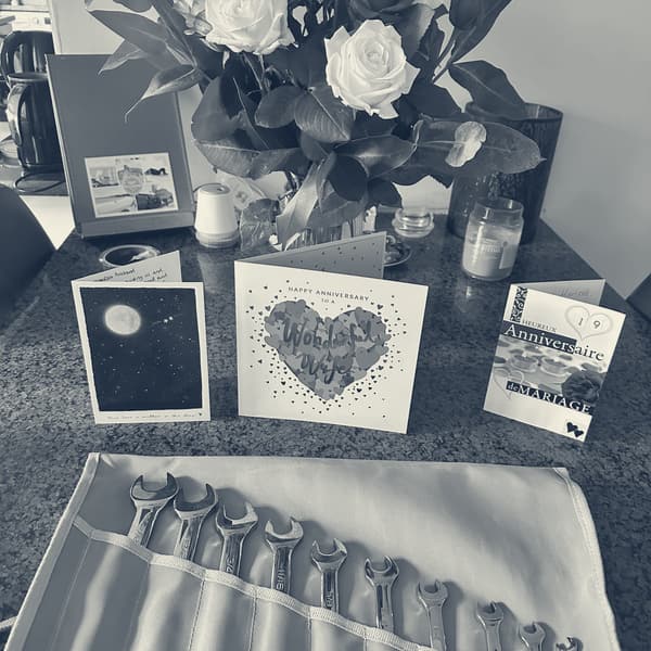 Spanners and roses, the anniversary morning