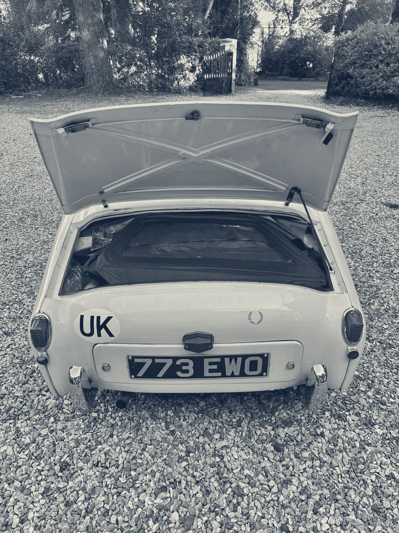 The open boot of TS2 packed to the lid with sidescreens, spares and tools