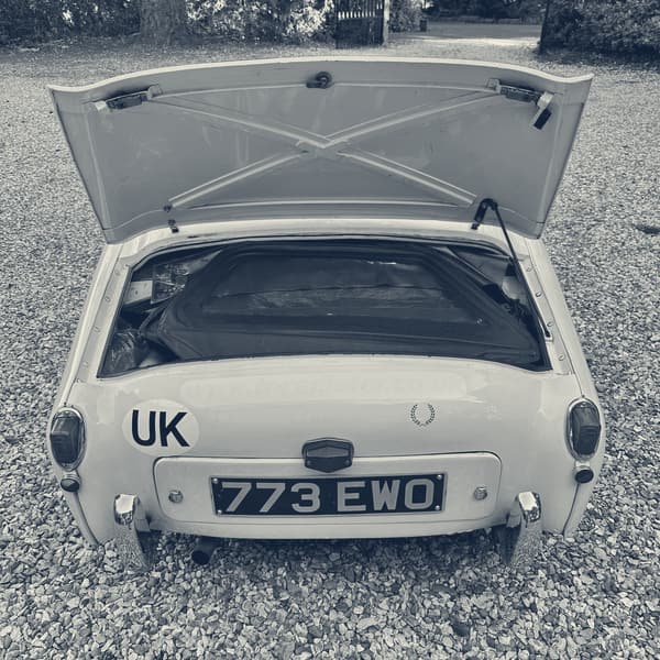 The open boot of TS2 packed to the lid with sidescreens, spares and tools